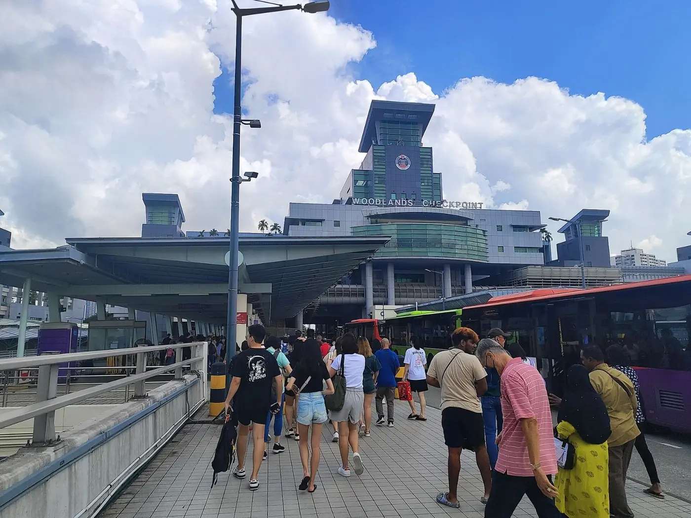 Travellers walking at Woodlands Checkpoint